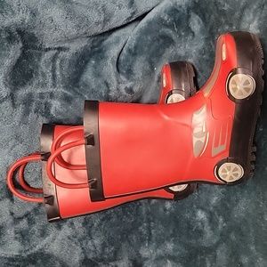 Toddler size 6 race car, rain boots.